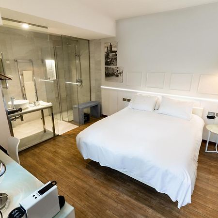 Cosmopolitano Hotel Boutique Santa Cruz de La Sierra Dış mekan fotoğraf A room at the hotel