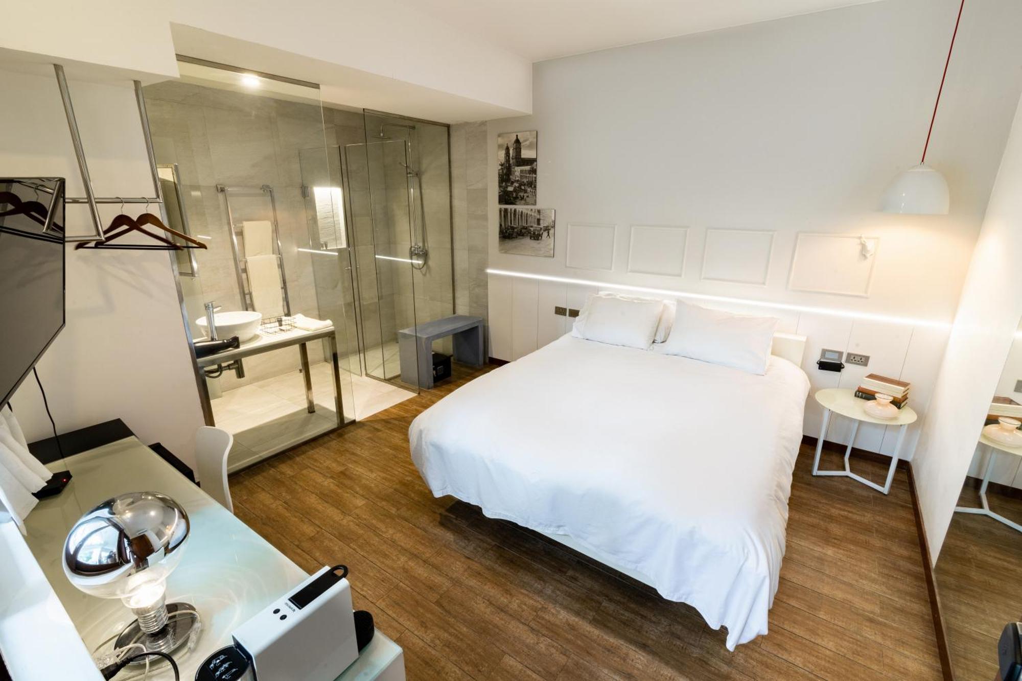 Cosmopolitano Hotel Boutique Santa Cruz de La Sierra Dış mekan fotoğraf A room at the hotel