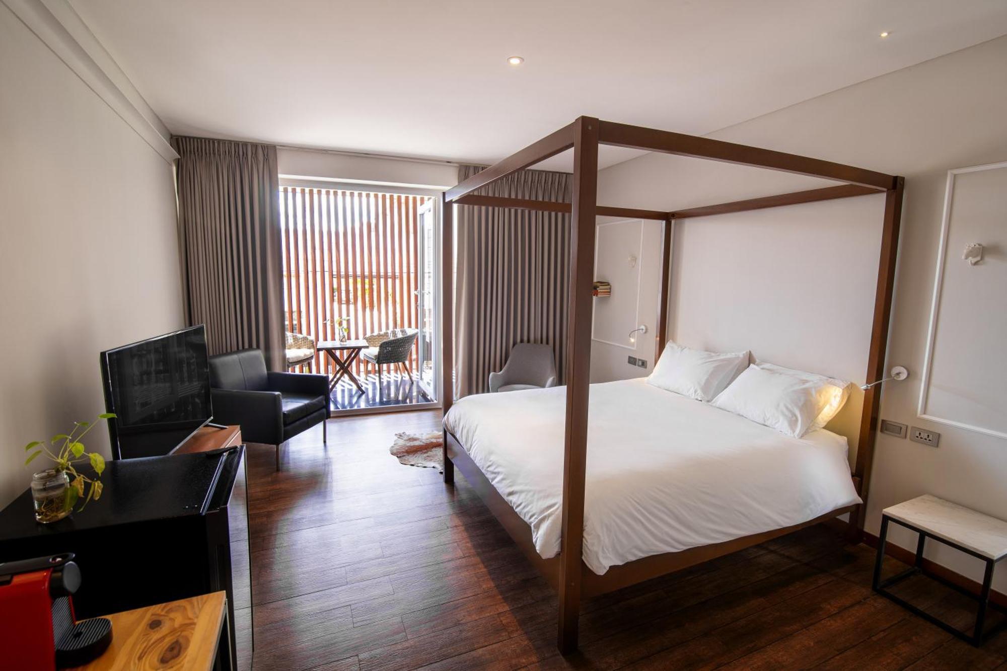Cosmopolitano Hotel Boutique Santa Cruz de La Sierra Dış mekan fotoğraf A room at the hotel