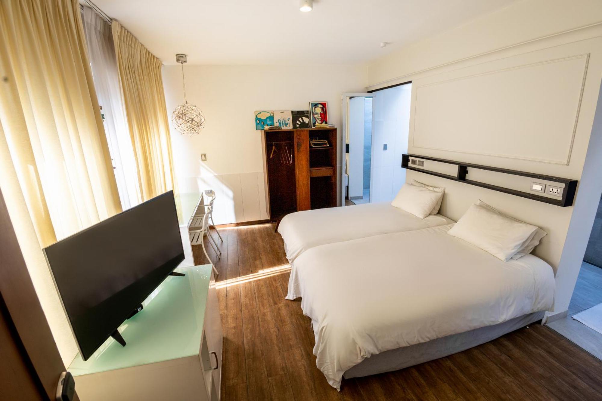 Cosmopolitano Hotel Boutique Santa Cruz de La Sierra Dış mekan fotoğraf A room at the hotel