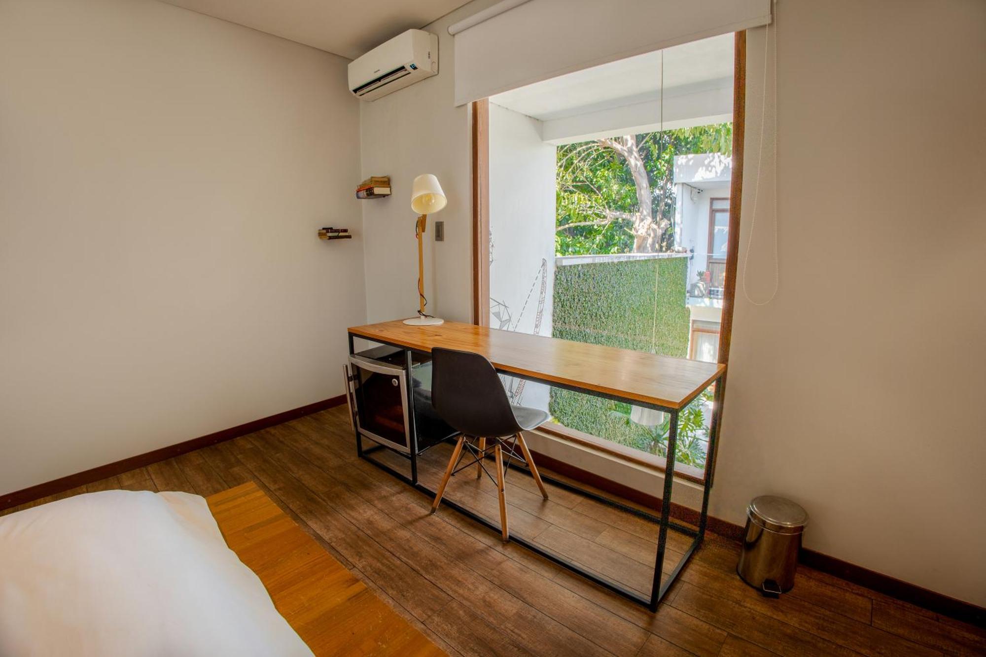 Cosmopolitano Hotel Boutique Santa Cruz de La Sierra Dış mekan fotoğraf A room at the hotel