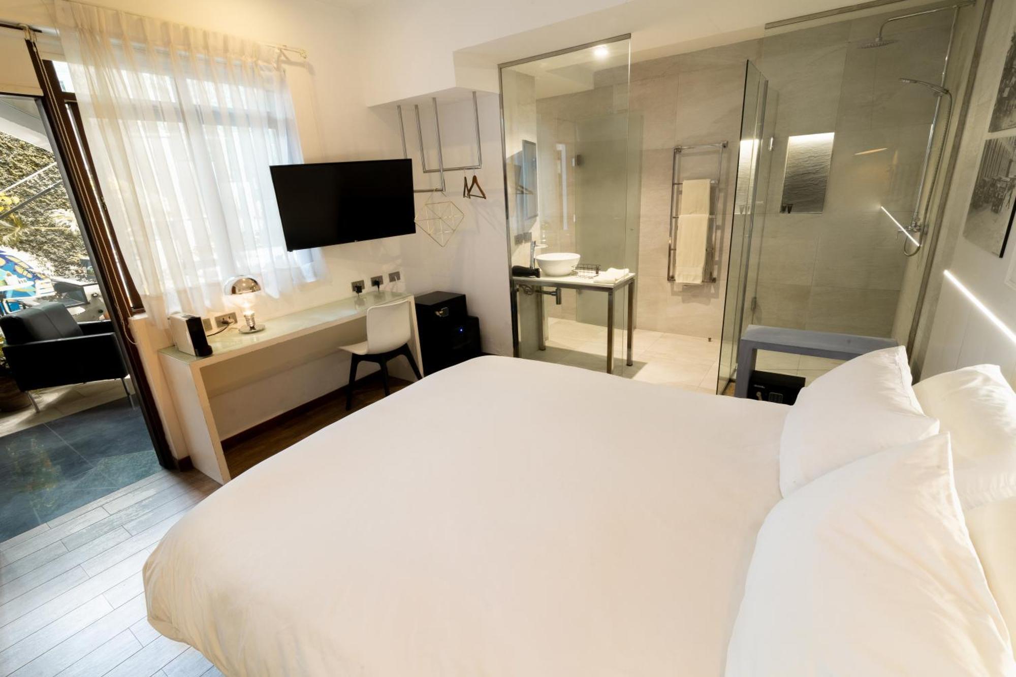 Cosmopolitano Hotel Boutique Santa Cruz de La Sierra Dış mekan fotoğraf A room at the hotel